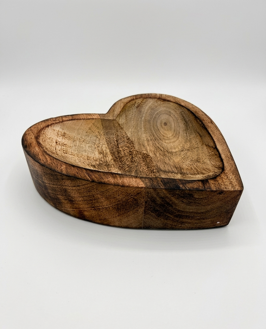 Wooden heart-shaped box on a white background